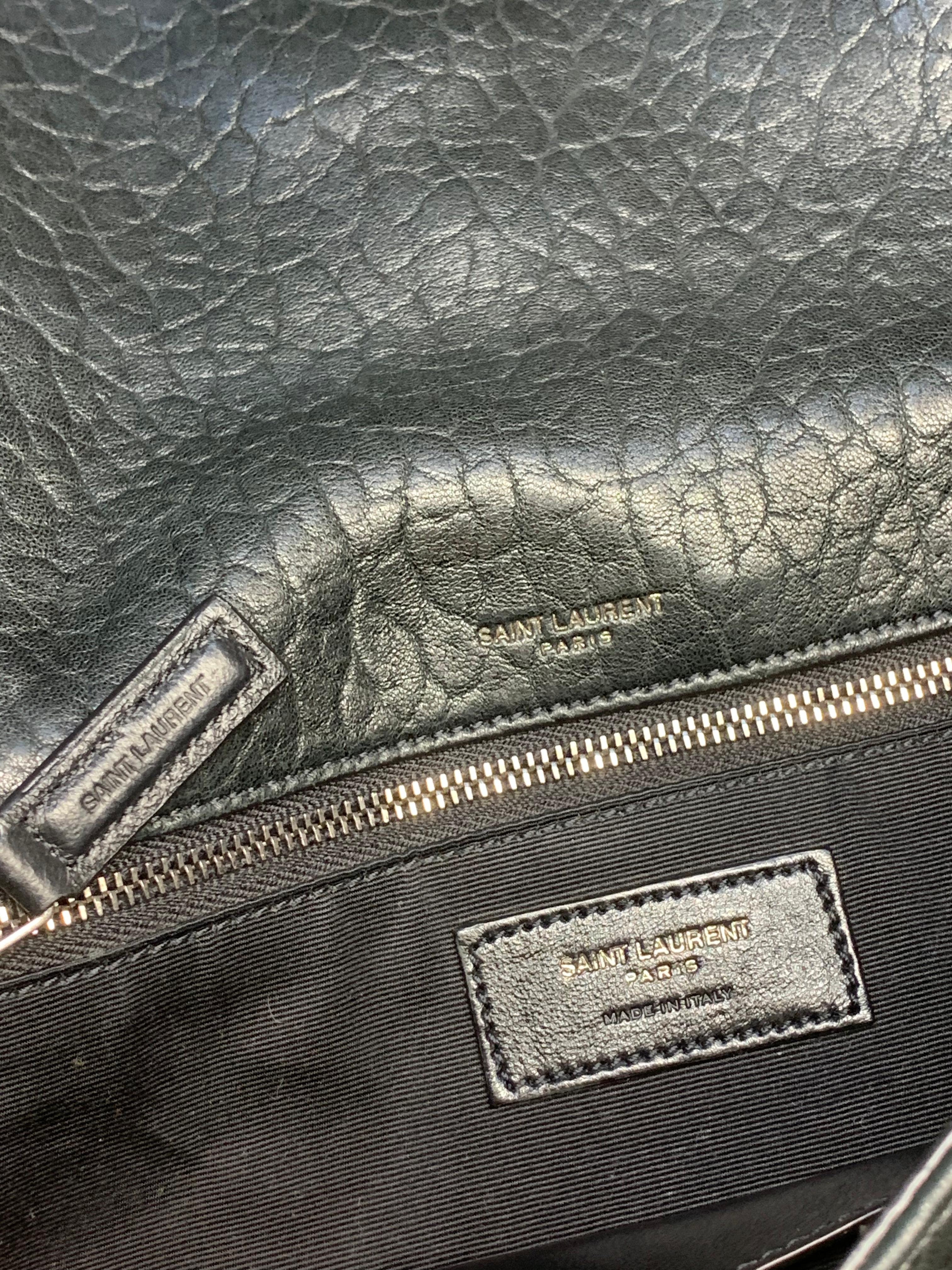Bolso Saint Laurent Monogram YSL en  piel granulada Negra con cadena Metalica.