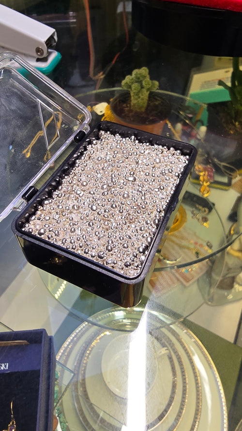 100 gramos de granalla de plata .999 de pureza.