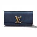 Cartera Louis Vuitton con cierre de solapa