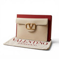 Clutch Valentino Garavani.